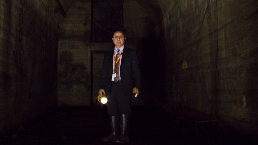 Tony Eid, executive director of Sydney Trains inside a disused St James station tunnel