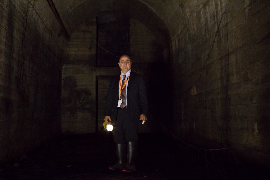 Tony Eid, executive director of Sydney Trains inside a disused St James station tunnel