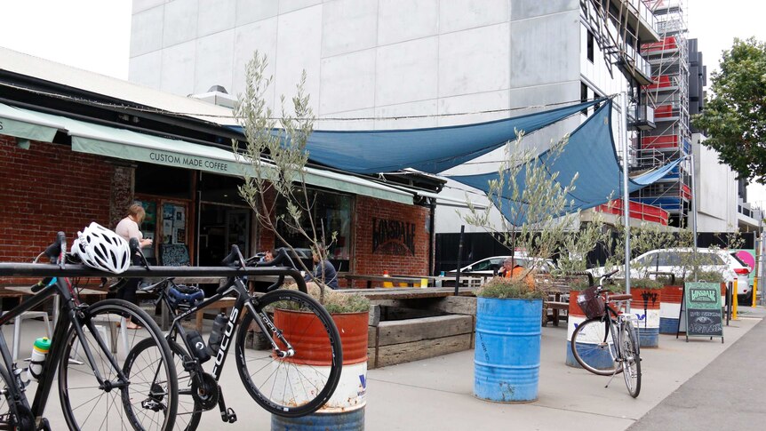 Bikes out the front of a cafe Lonsdale Street in Braddon with a building site in the background.