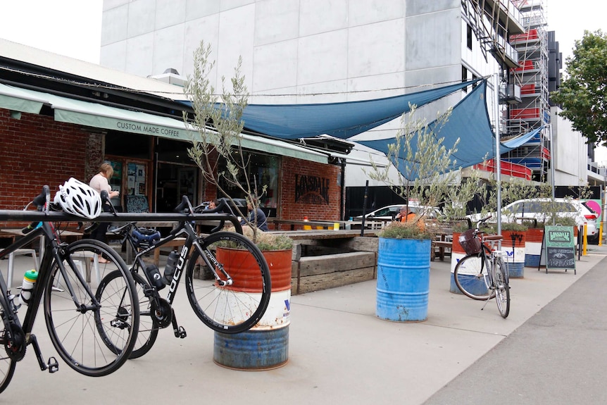 Bikes out the front of a cafe Lonsdale Street in Braddon with a building site in the background.