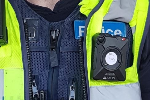 A sticker on a police body camera which said EAD hippy.