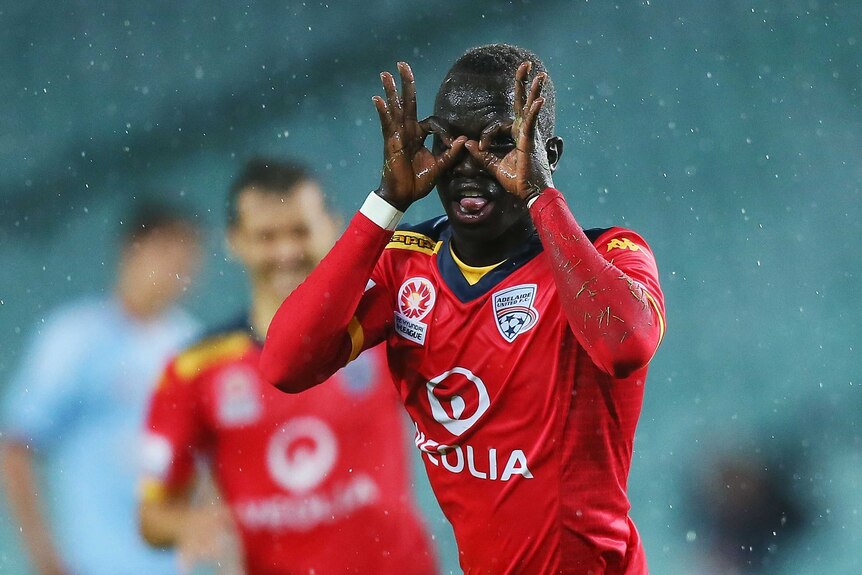 Awer Mabil celebrates his goal against Sydney FC