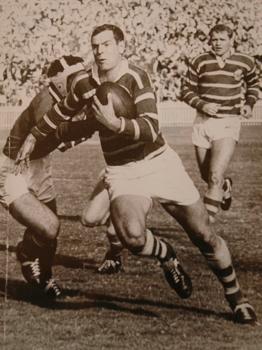 Ken Thornett playing rugby.