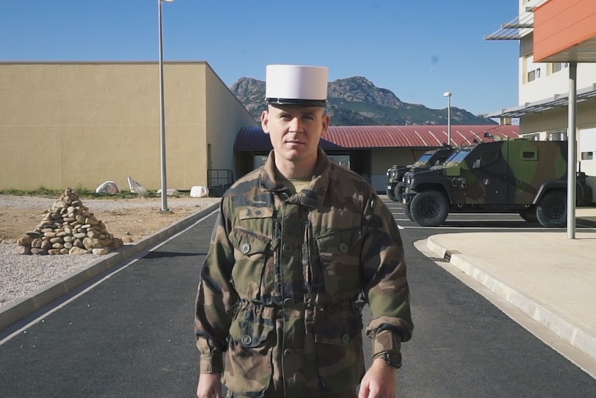 First Class Legionnaire Scott wears his kepi blanc at the Legion's base in Corsica.