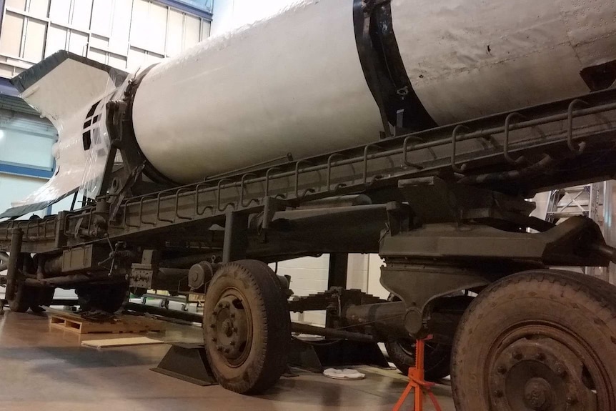 A V-2 rocket on tis trailer.