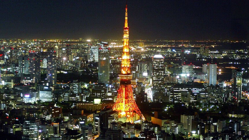 Tokyo Tower, which resembles the Eiffel Tower, is illuminated in the middle of the Japanese capital.