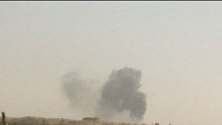 Smoke was seen rising from the scene of the attack on the Iraqi National Guard base.