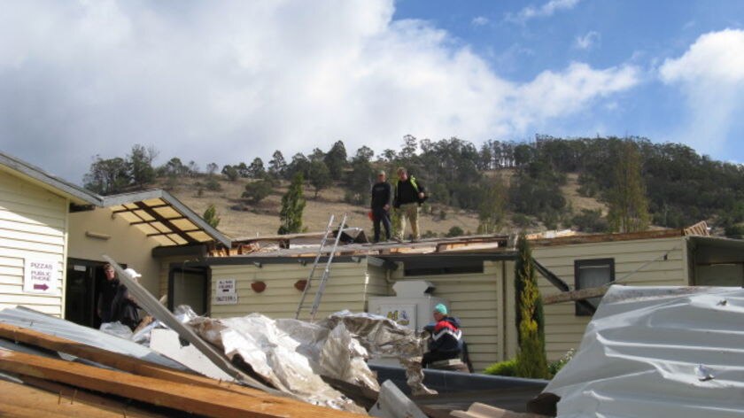 Workers on storm damaged roof Cambridge, Tas April 2008
