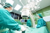 Doctors in an operating theatre.