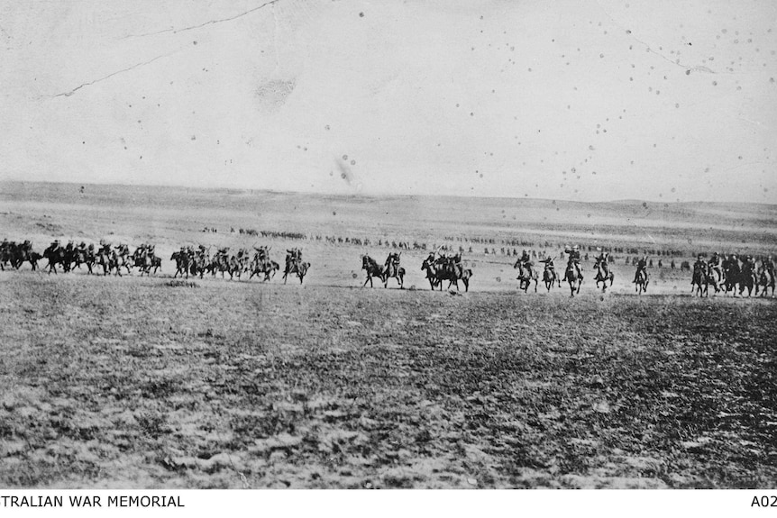 A black and white photo from 1917, or hundreds of Light Horsemen attacking the Turks at Beersheba in 2017.