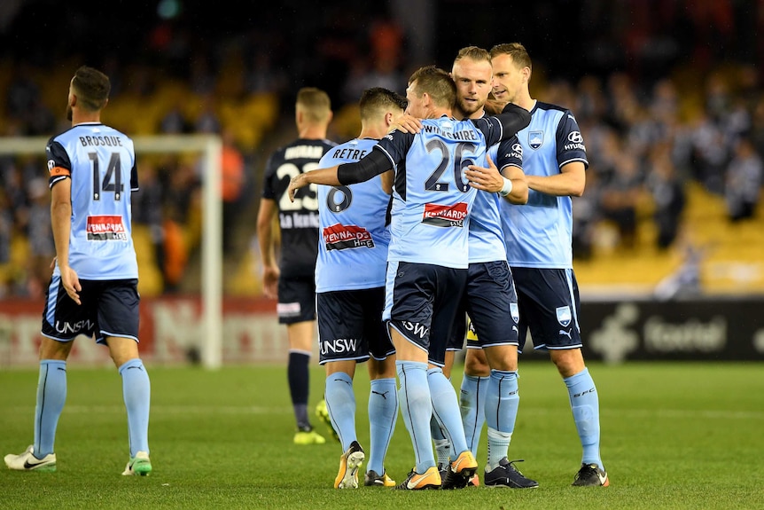 Sydney FC players hug it out