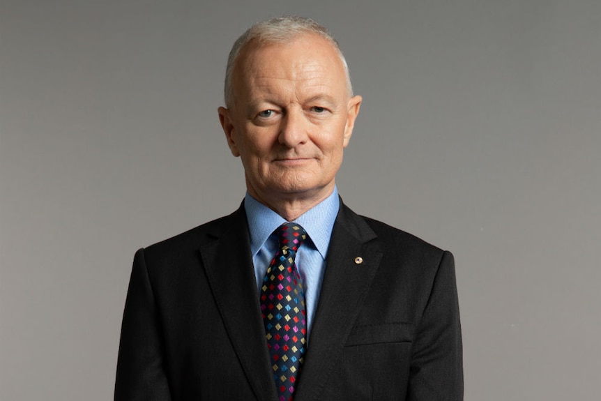 ABC election expert Antony Green, wearing a suit, looks at the camera.