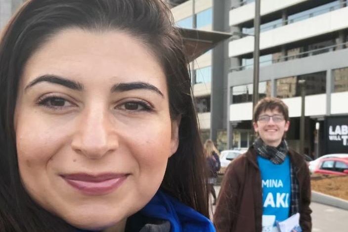 A selfie of Mina Zaki and a campaign volunteer.