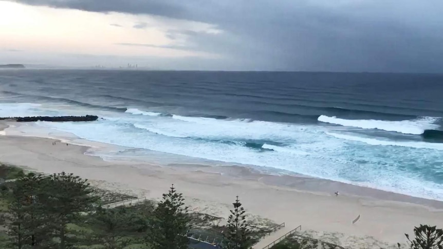 Waves rolling into the beach on the southern Gold Coast