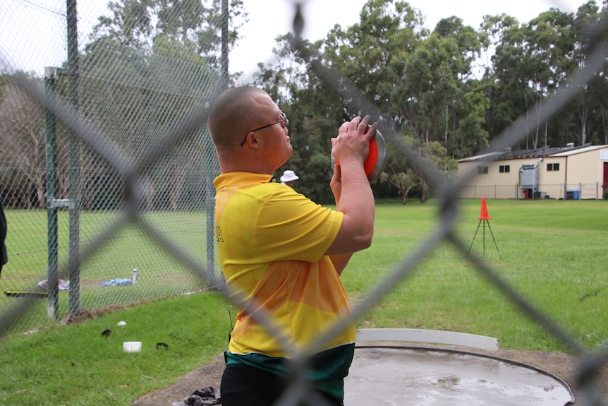 Rivett prepares to throw his discus at a training session on the Gold Coast