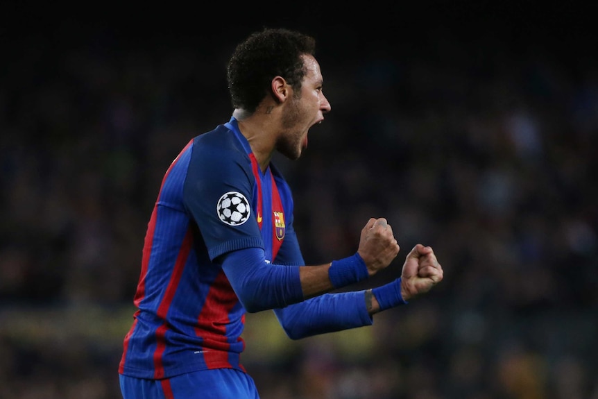 Barcelona's Neymar celebrates scoring a goal against Paris St Germain at the Nou Camp.