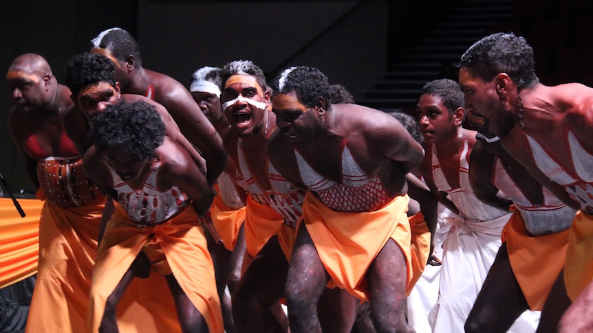 Traditional Aboriginal dancers perform at the funeral of musician Dr G Yunupingu.