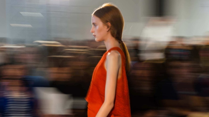 A model walks the runway during a Ginger and Smart show at Australian Fashion Week in Sydney on April 8, 2014.