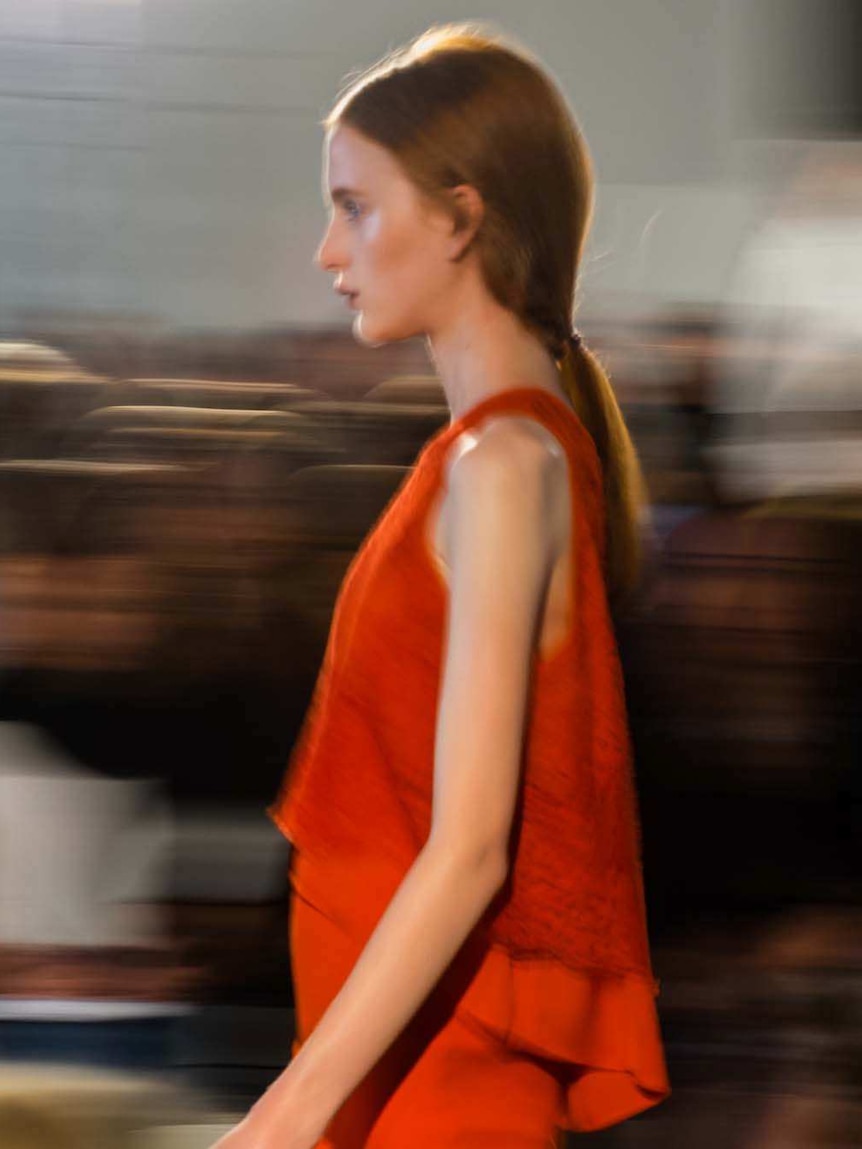 A model walks the runway during a Ginger and Smart show at Australian Fashion Week in Sydney on April 8, 2014.