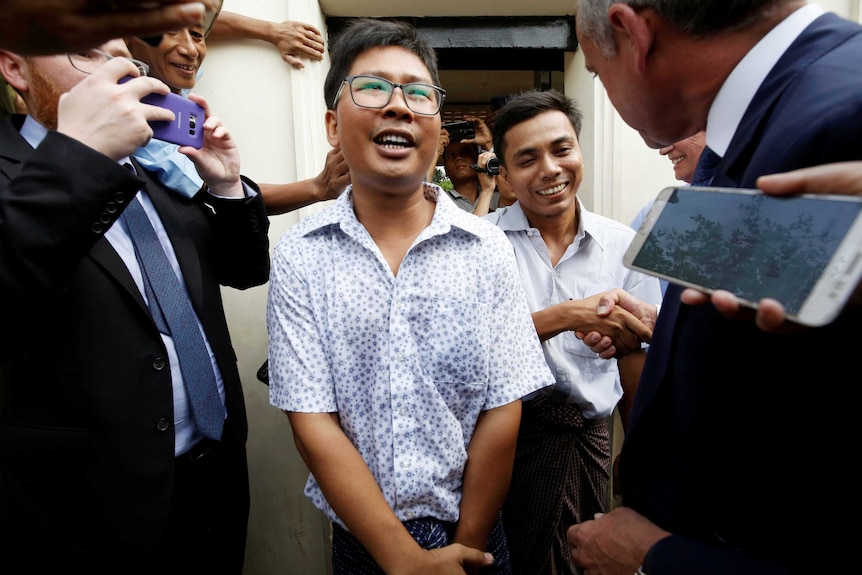 Reuters reporters Wa Lone and Kyaw Soe Oo step outside Myanmar's Insein prison gates and are greeted by throngs of well-wishers.