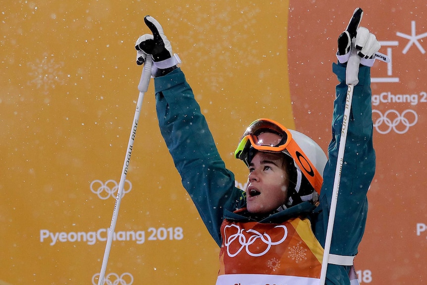 Australia's Britt Cox reacts after finishing a run in the women's moguls final