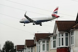 An aircraft comes in to land at Heathrow airport.
