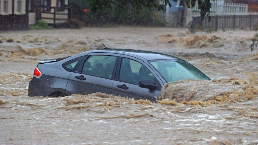 Car covered in flood waters