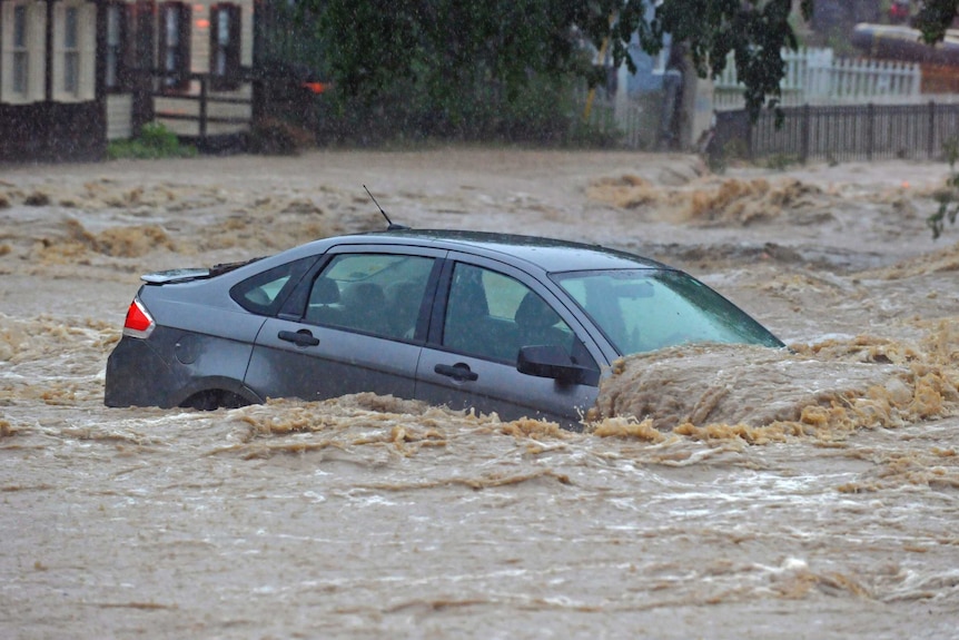 Car covered in flood waters