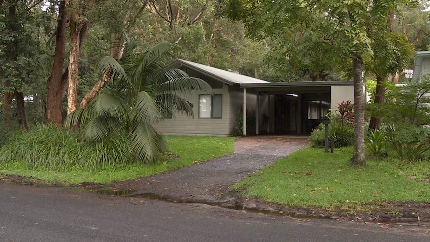 A house surrounded by trees