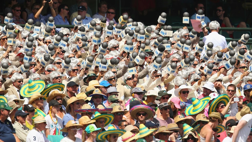 Richie Benaud impersonators cheer during Fifth Ashes Test in Sydney