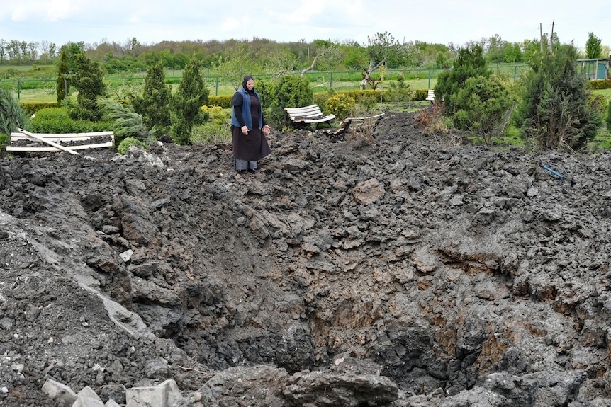 A crater of an explosion after Russian shelling