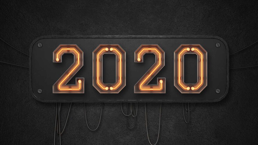 Large lit up sign with '2020' written on it, against black background