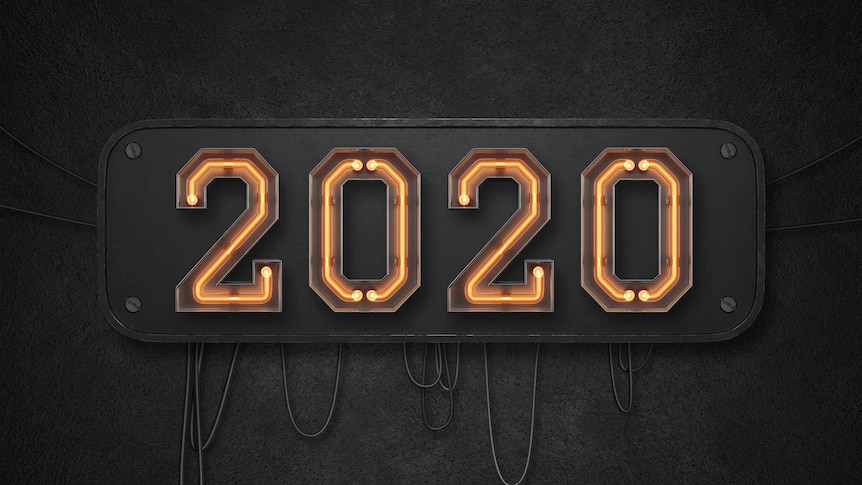 Large lit up sign with '2020' written on it, against black background