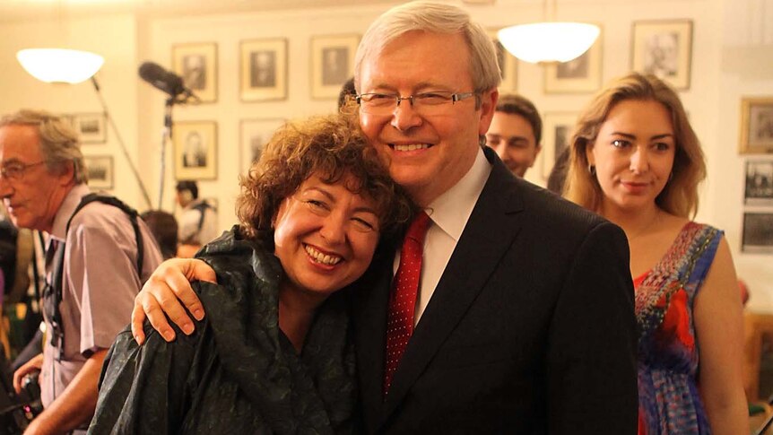 Kevin Rudd hugs his wife Therese Rein