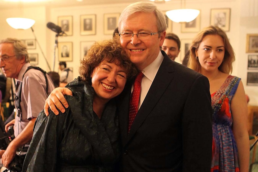 Kevin Rudd hugs his wife Therese Rein