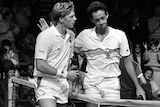 A black and white photo shows Peter Doohan and Boris Becker after their Wimbledon match in 1987.