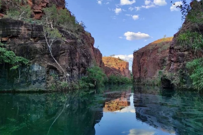 Clear water gorge between two cliffs.