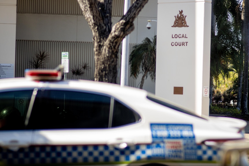 A police car outside the Darwin Local Court. 