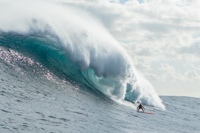 Jamie Mitchell riding a big wave
