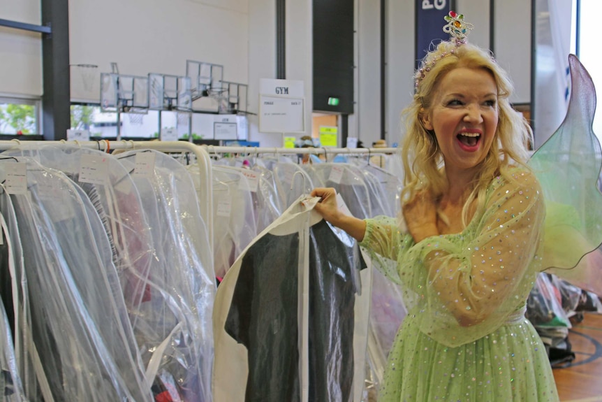Christmas fairy finds her costume in the dressing rooms