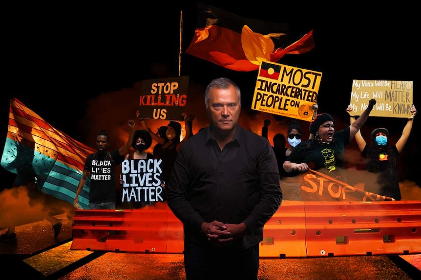 Stan Grant stands in front of Black Lives Matter protesters.