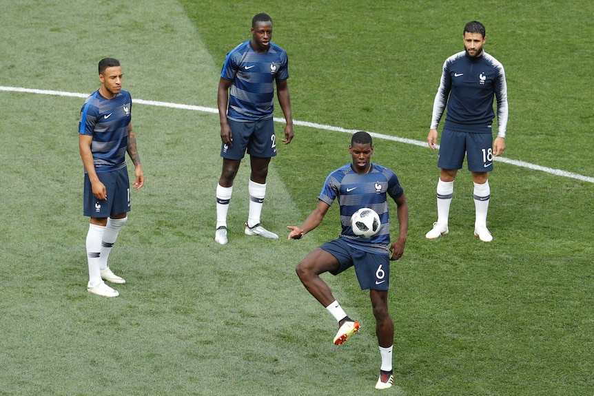 France's Paul Pogba juggles the ball in warm-up