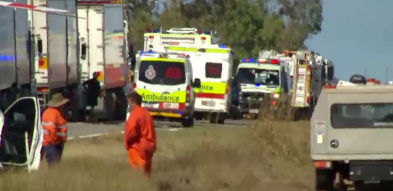 Police and ambulance workers at the scene of a fatal bus crash.
