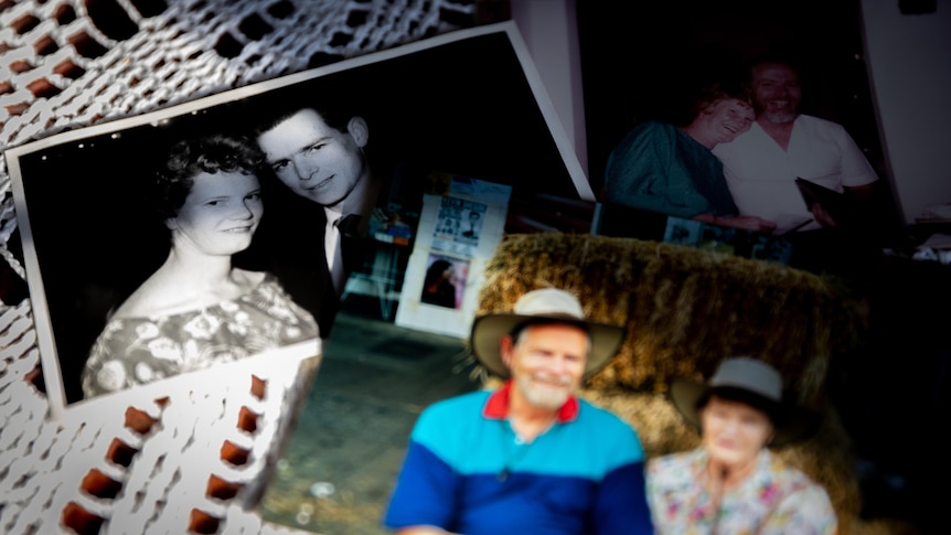 Three printed photos of an older man and woman collaged together on a table.