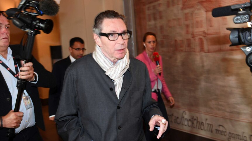 Jean-Claude Arnault arrives at the district court for the start of court proceedings last month.