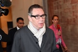 Jean-Claude Arnault arrives at the district court for the start of court proceedings last month.