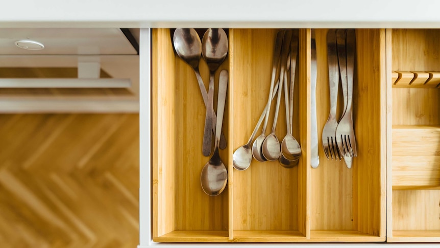 Teaspoons in a drawer in the office