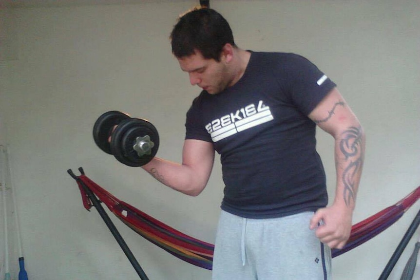 Jack Nankervis holding lifting weights