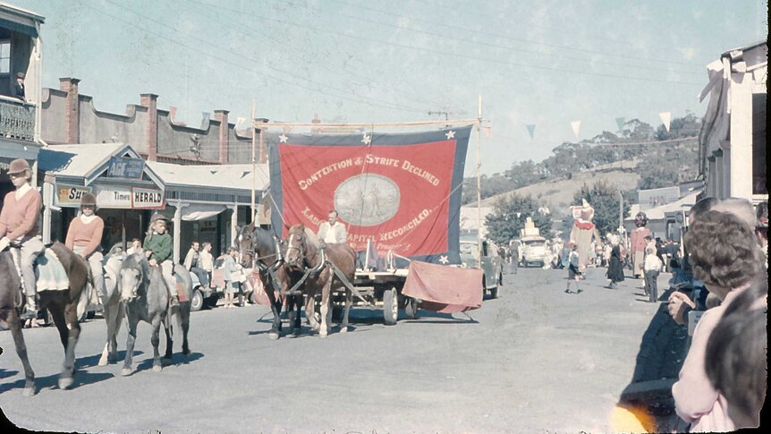A horse and cart with the Maldon banner