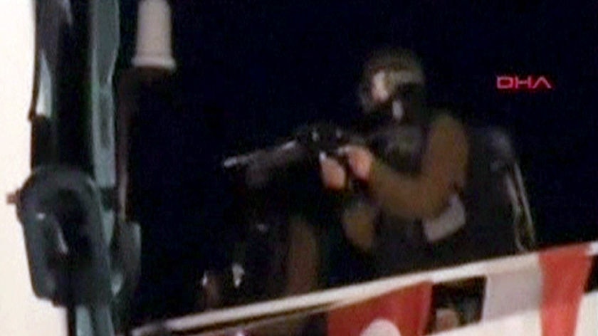 An Israeli commando lands on a Gaza-bound ship in the Mediterranean Sea